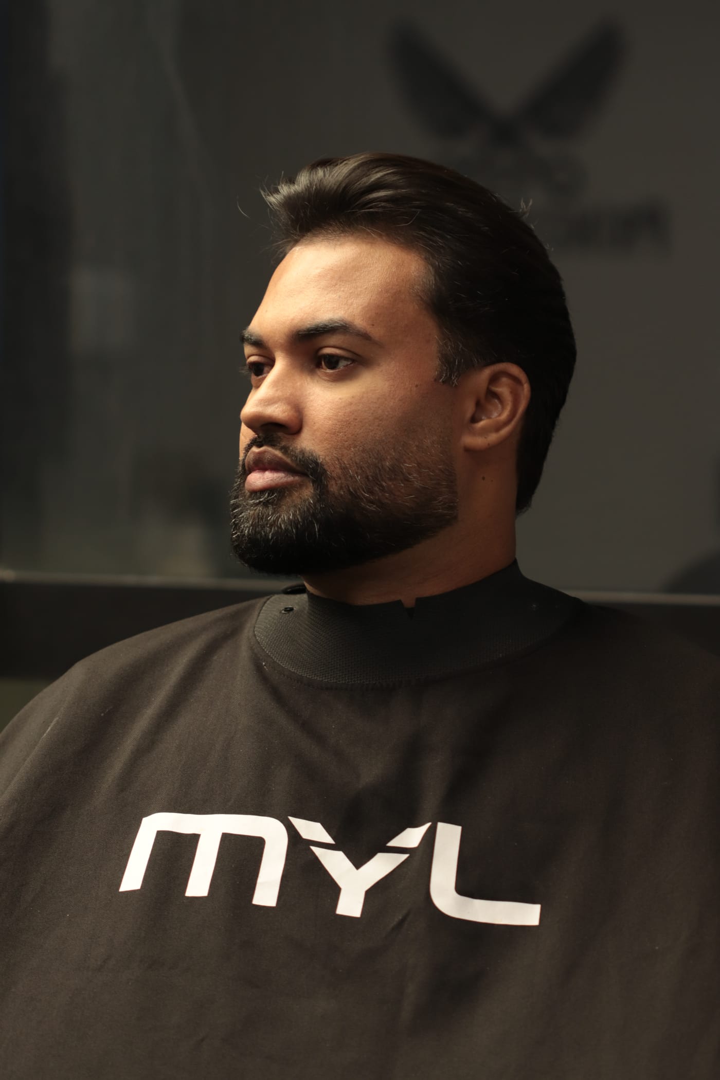 Cliente MYL Barber Clinic com corte finalizado